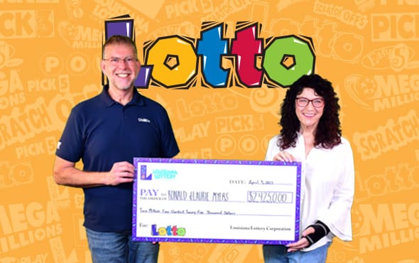 Ronald Myers and wife, Laurie, presented with their “big check” at Lottery Headquarters after claiming the April 9 Lotto jackpot prize.